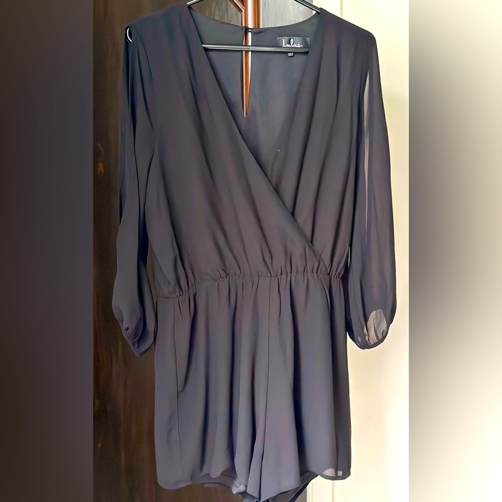 Lulus dress/short, with shoulder slits.